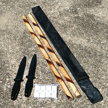 Load image into Gallery viewer, Kali Starter Kit bundle contents on pavement, showing rattan sticks, rubber training knives, grip tape, and carrying case
