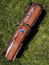 Load image into Gallery viewer, Blaan tabih dreamweave yoga mat bag, angled view showing woven ikat pattern and adjustable strap
