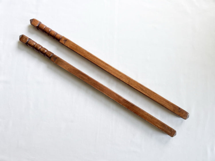 Pair of Tiger Kamagong War Sticks 3.0 full-length view